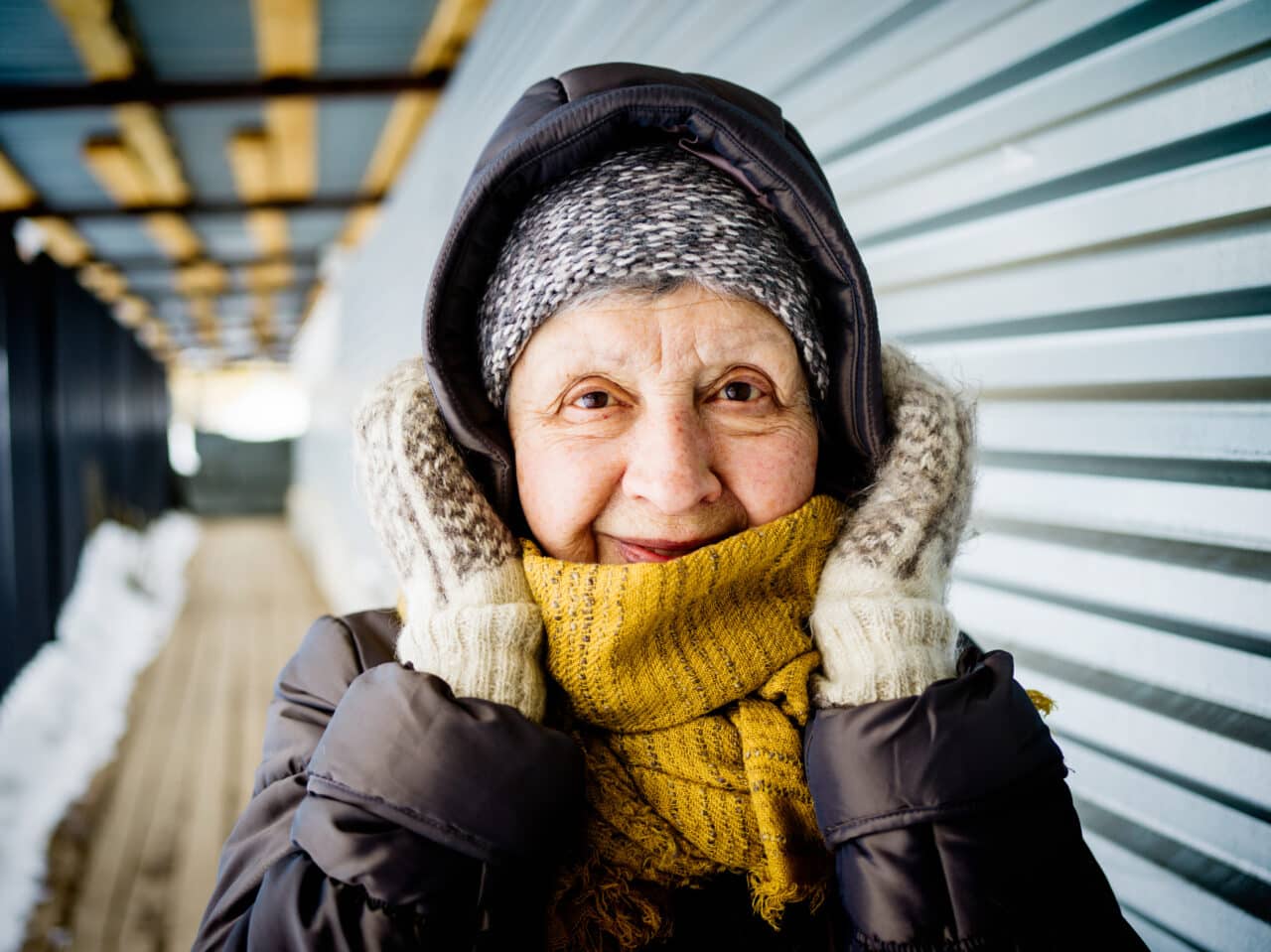 Woman bundled up for cold winter weather.