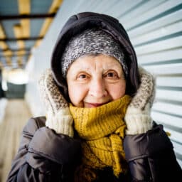 Woman bundled up for cold winter weather.
